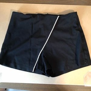 A’Gaci black w/ white trim skorts. 28 waist